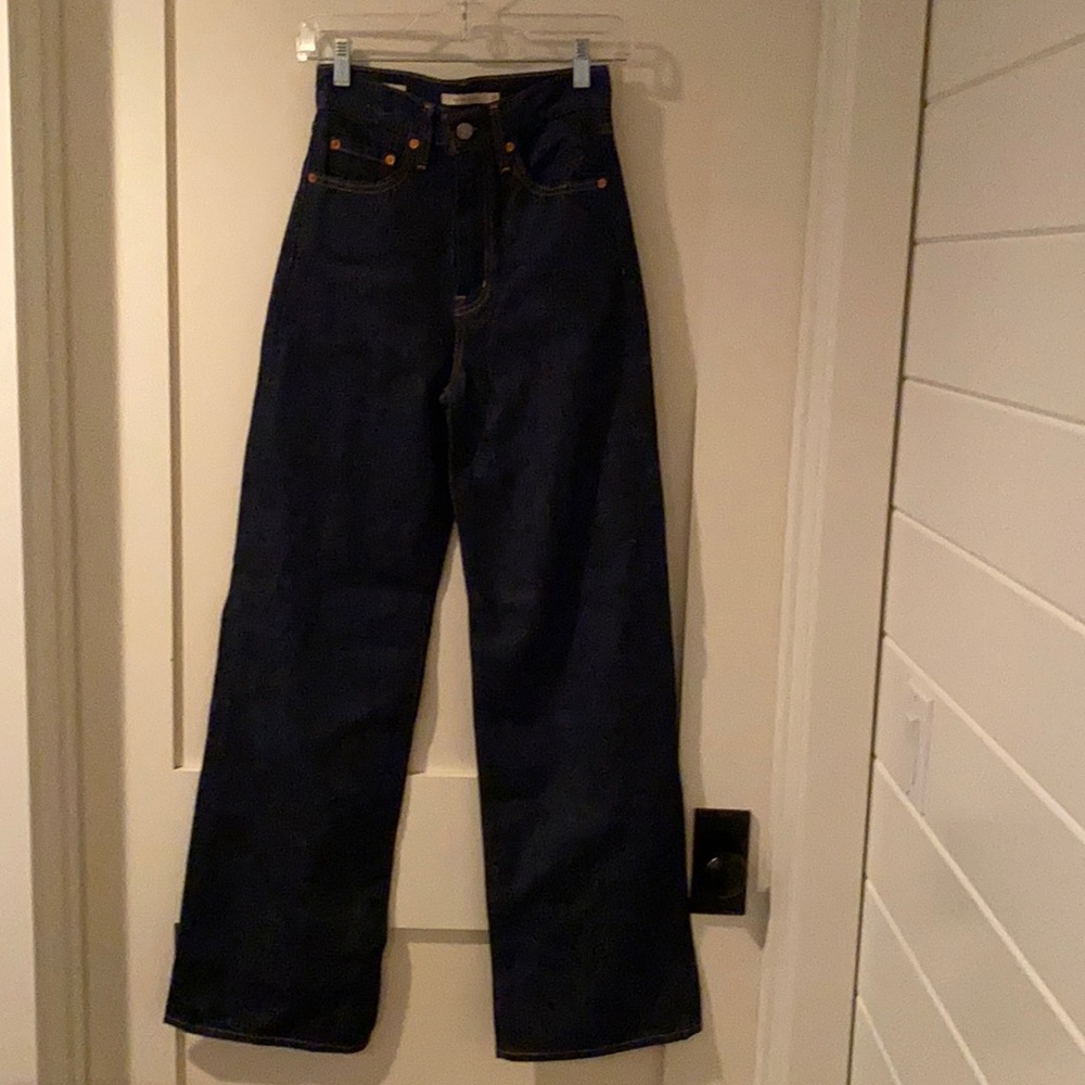 High waist, Inseam 31”, dark wash, flared leg Levi’s